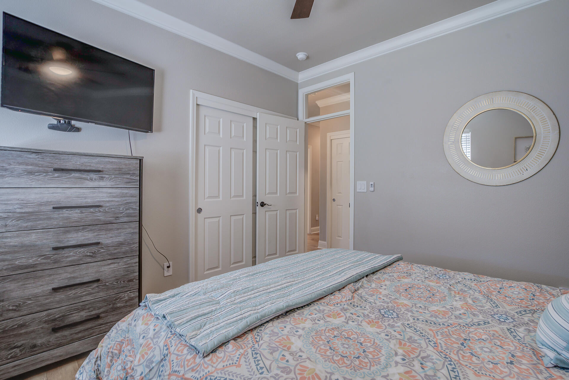 4090 Cambria Drive Redding, CA 96002 - Photo 28 of 48 a bedroom with a bed and a flat screen tv