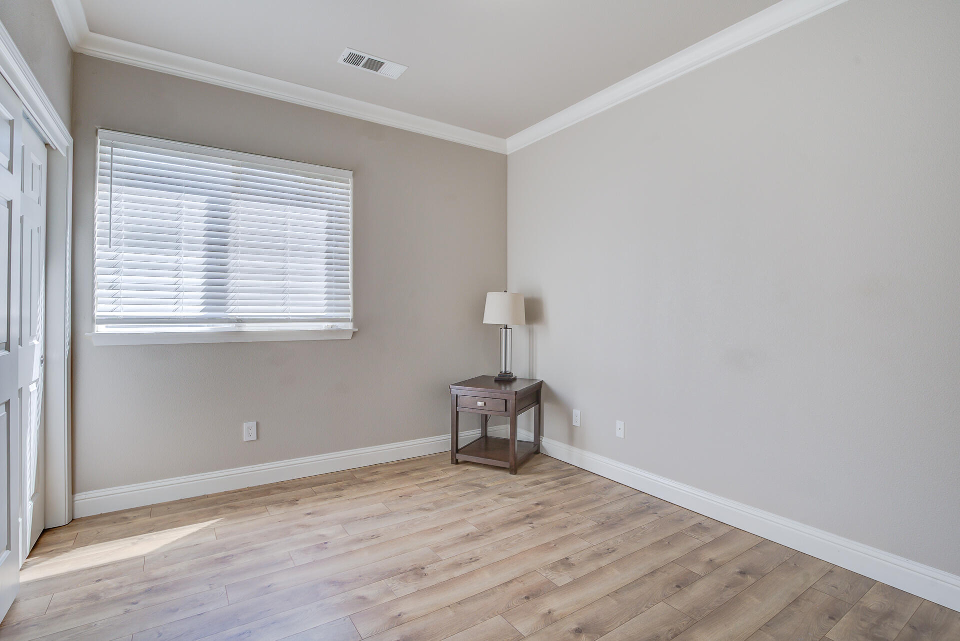 4090 Cambria Drive Redding, CA 96002 - Photo 29 of 48 a view of empty room with wooden floor and fan