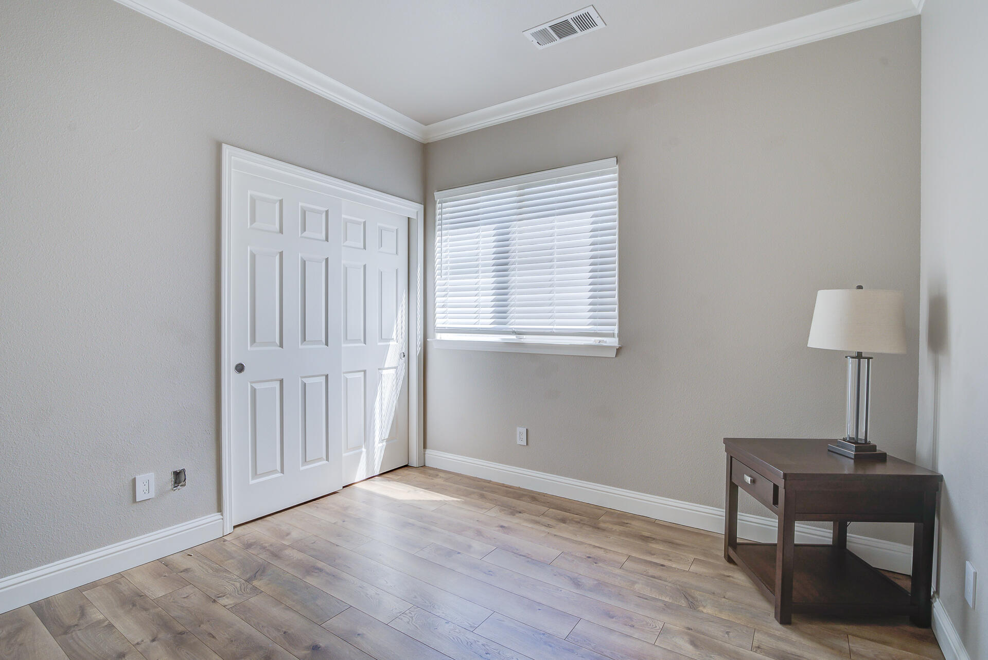4090 Cambria Drive Redding, CA 96002 - Photo 30 of 48 a view of a room with wooden floor windows and cabinet
