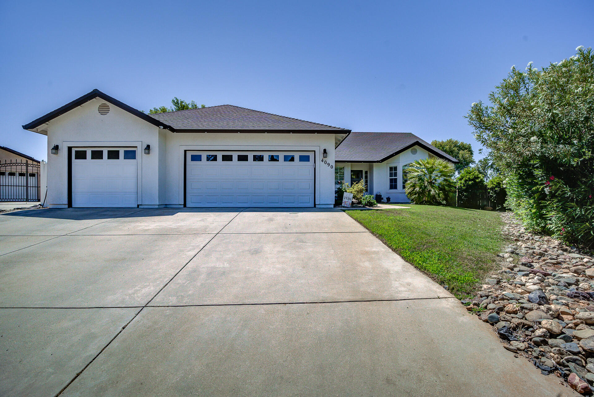 4090 Cambria Drive Redding, CA 96002 - Photo 3 of 48 a front view of house with yard and green space