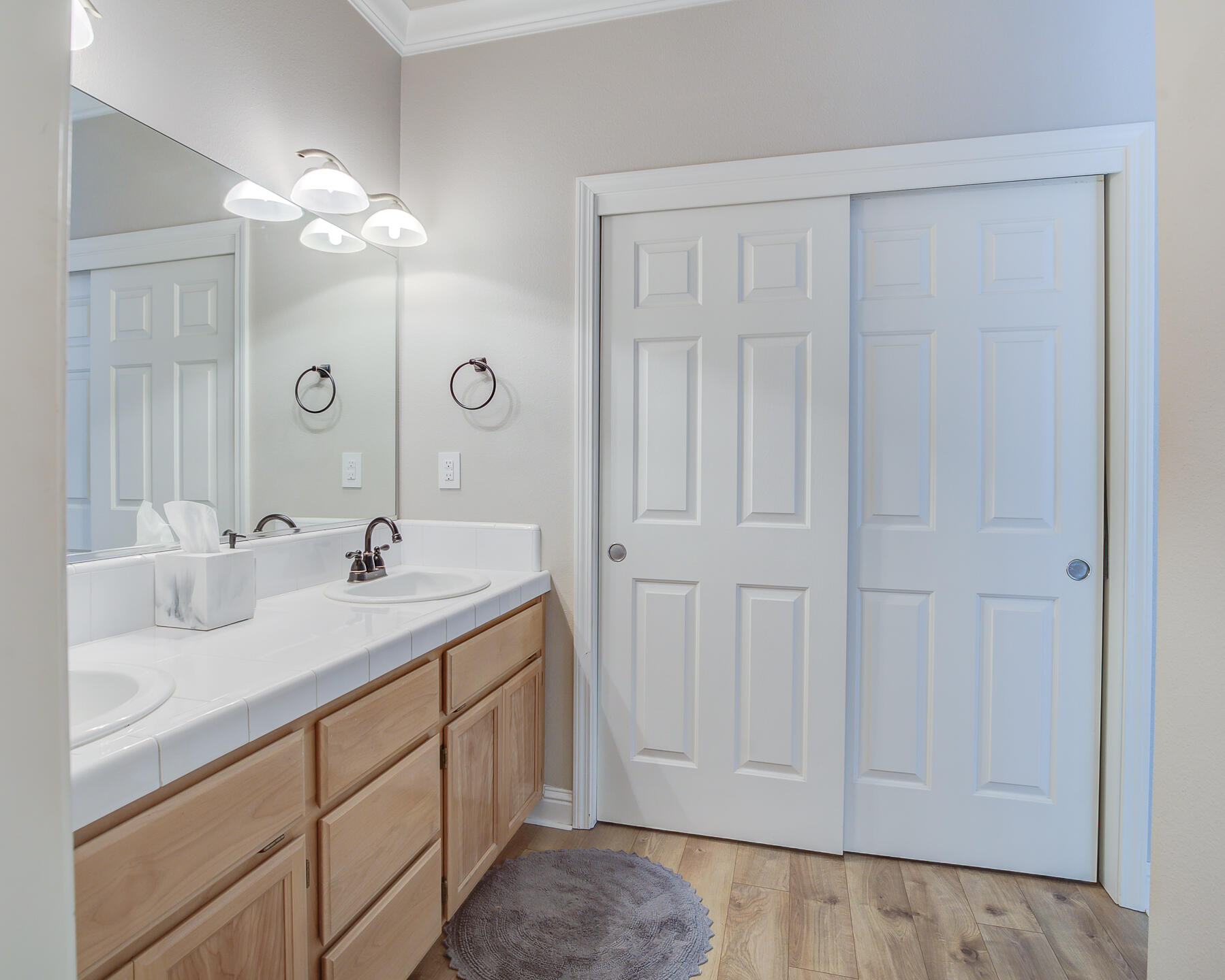 4090 Cambria Drive Redding, CA 96002 - Photo 35 of 48 a bathroom with a sink vanity and mirror