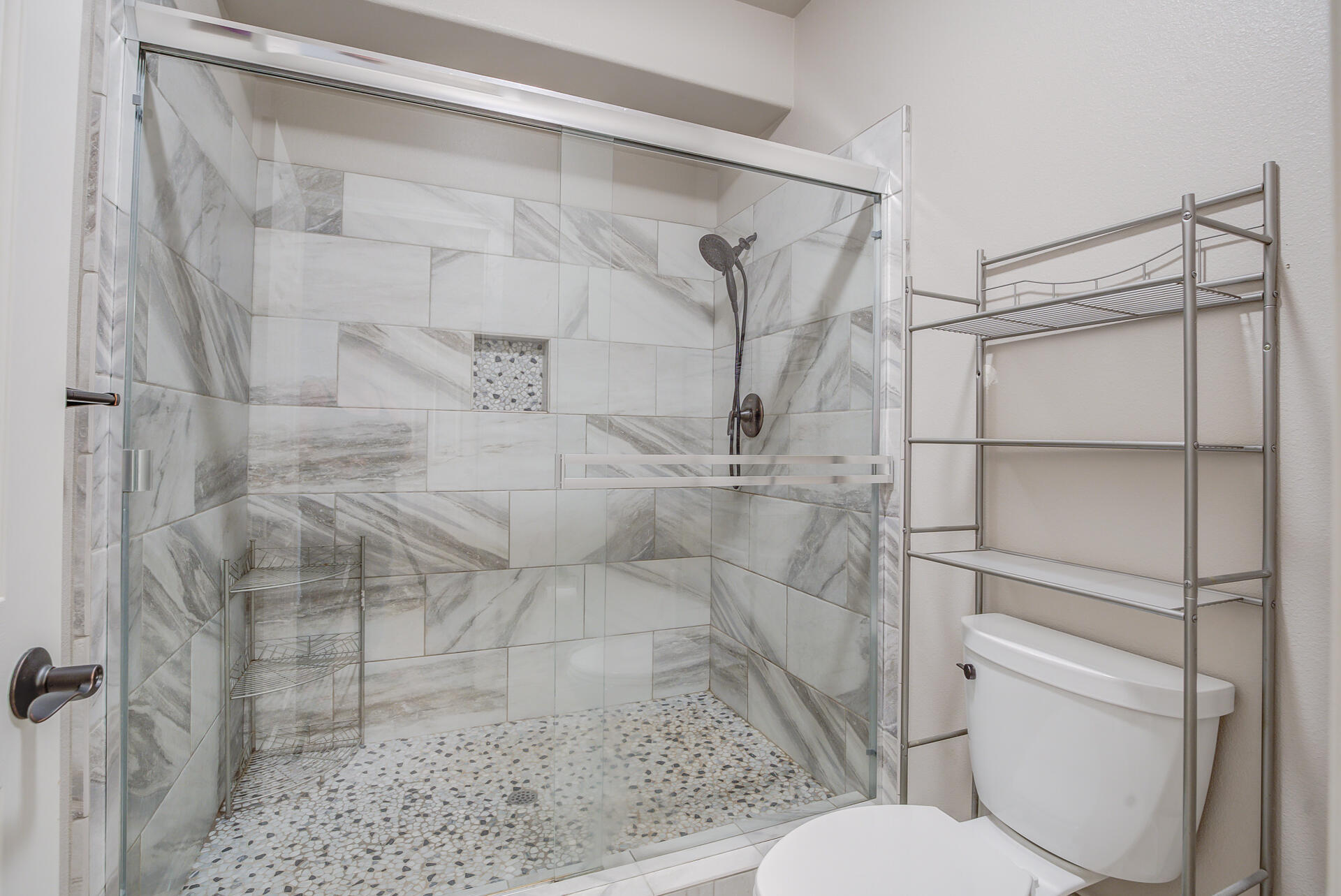 4090 Cambria Drive Redding, CA 96002 - Photo 36 of 48 a bathroom with a shower and a toilet