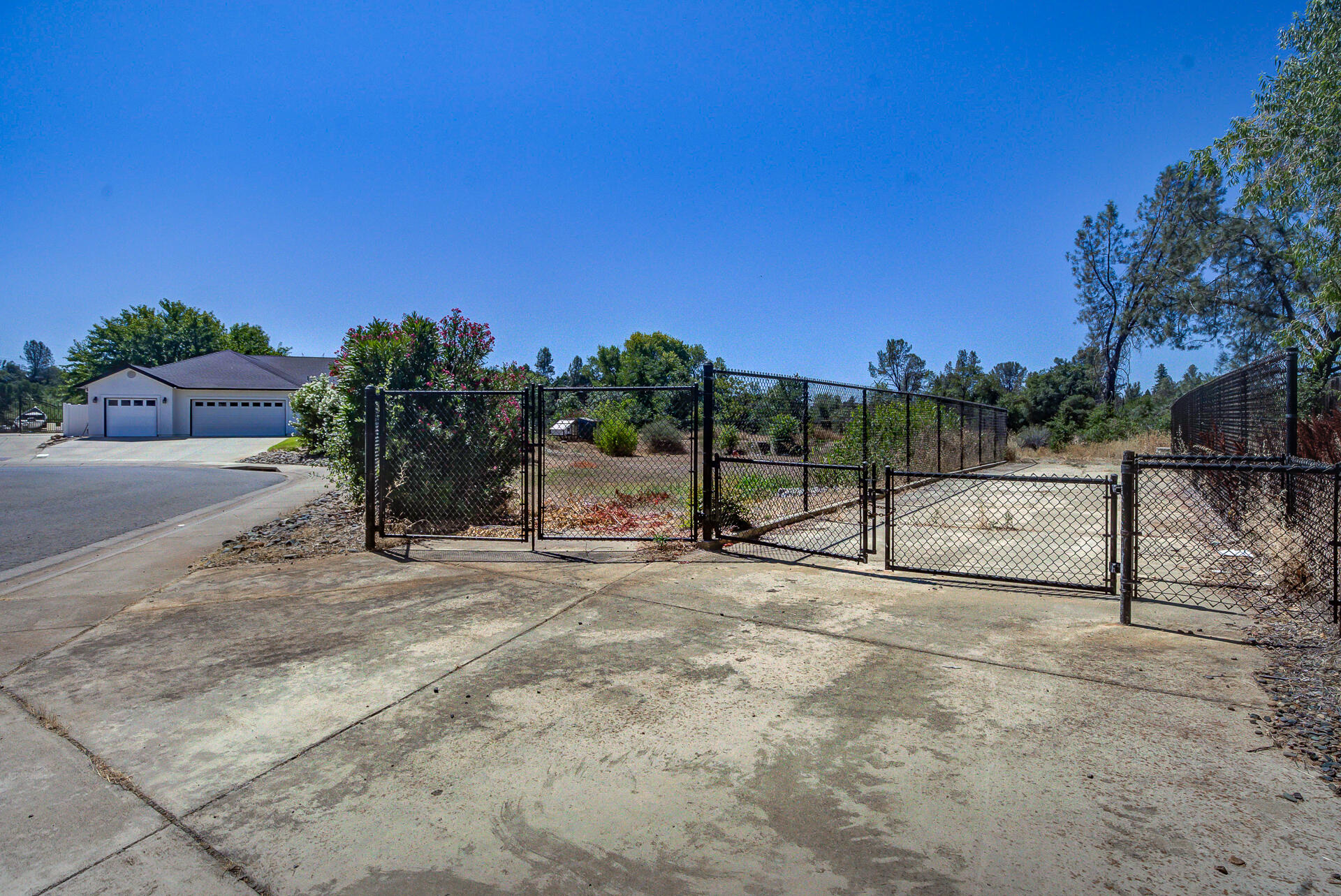 4090 Cambria Drive Redding, CA 96002 - Photo 48 of 48 a view of a park with a trees in the background