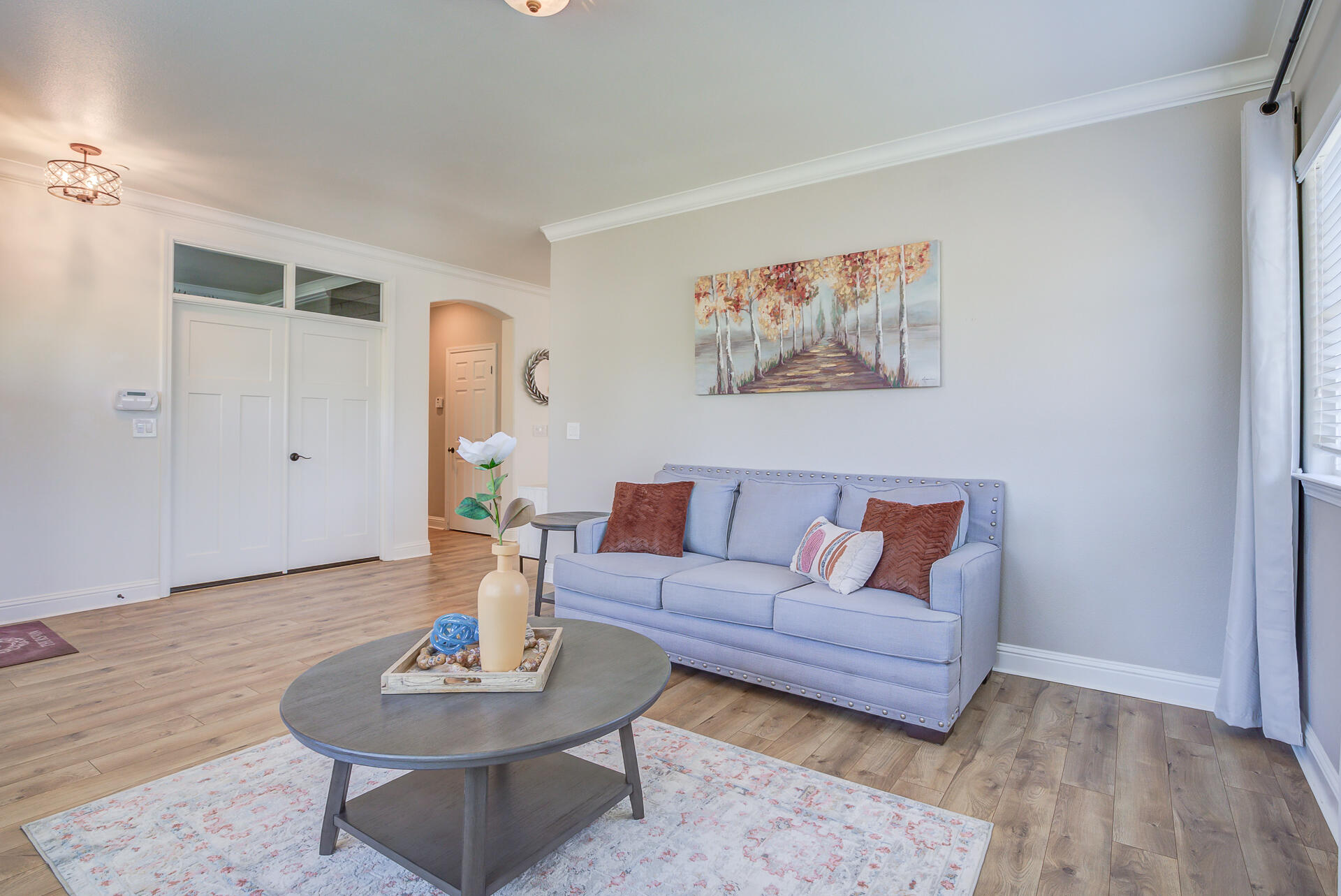 4090 Cambria Drive Redding, CA 96002 - Photo 7 of 48 a living room with furniture and wooden floor