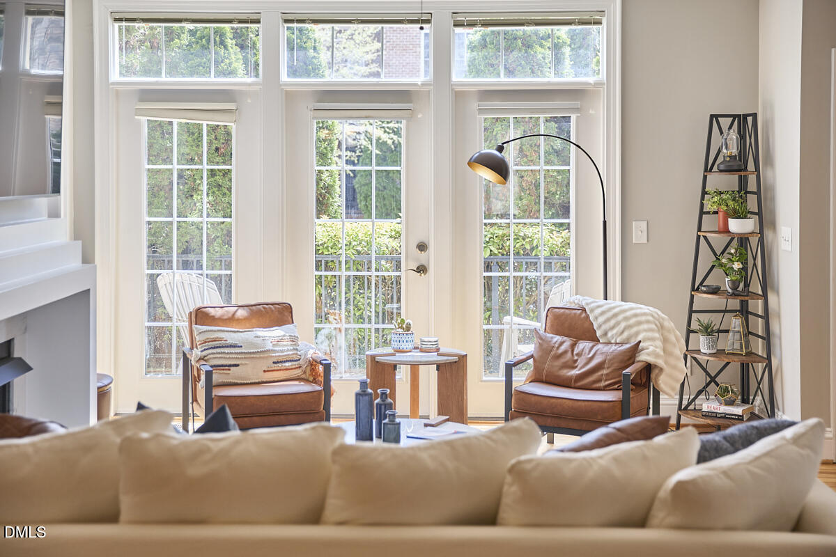 203 Valleyshire Road Durham, NC 27707 - Photo 14 of 37 a living room with furniture and a large window