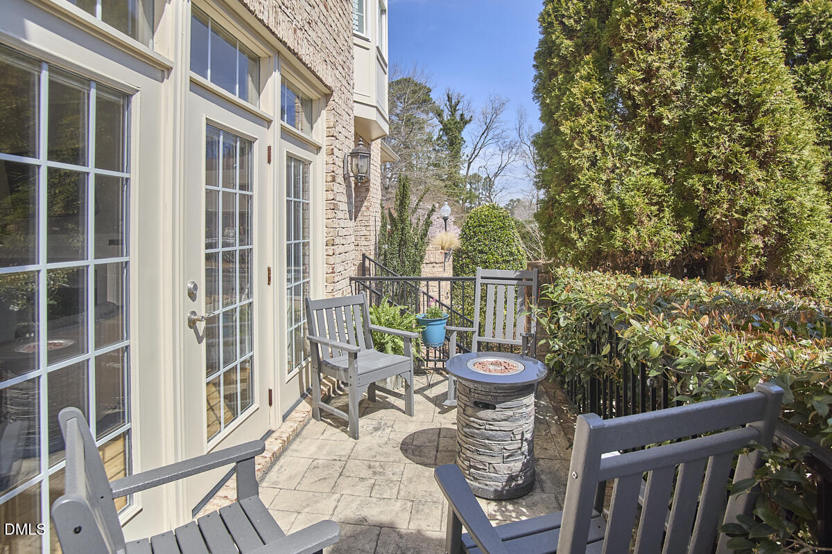 203 Valleyshire Road Durham, NC 27707 - Photo 35 of 37 a view of a patio with iron fence