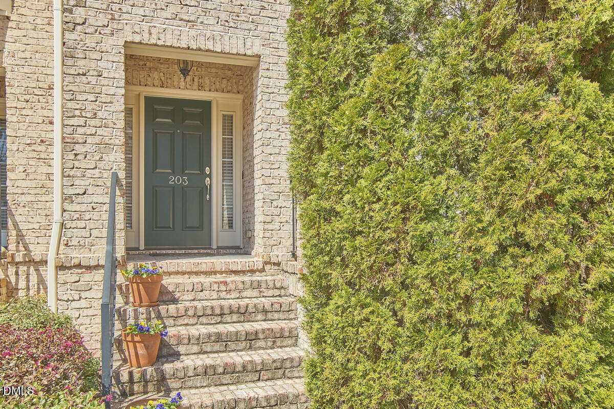 203 Valleyshire Road Durham, NC 27707 - Photo 3 of 37 a view of a door of a house with a window
