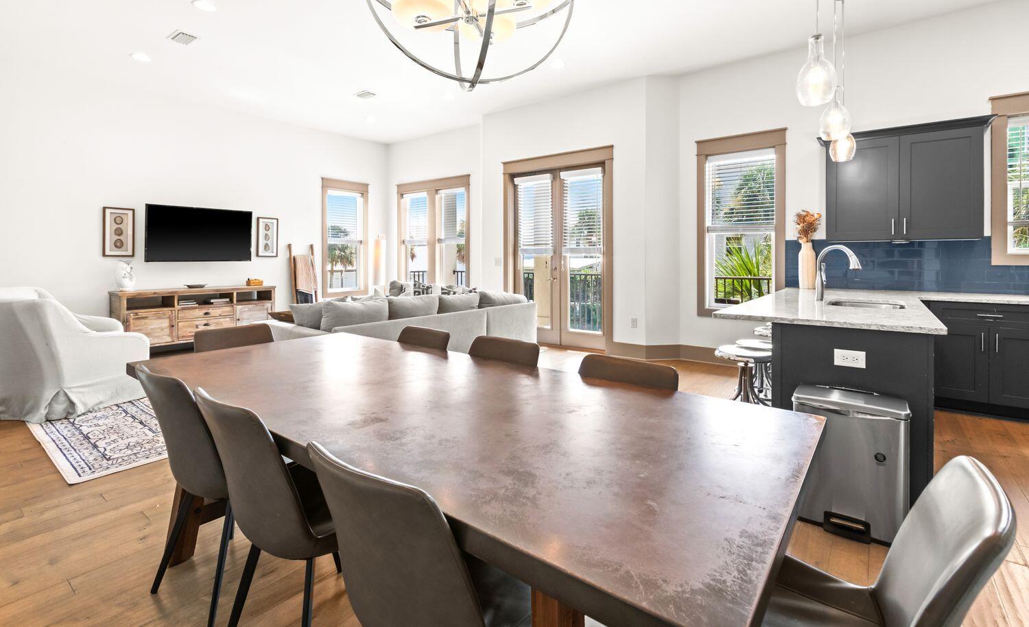 178 Woodward Drive Santa Rosa Beach, FL 32459 - Photo 13 of 29 a view of a dining room with furniture and a large window