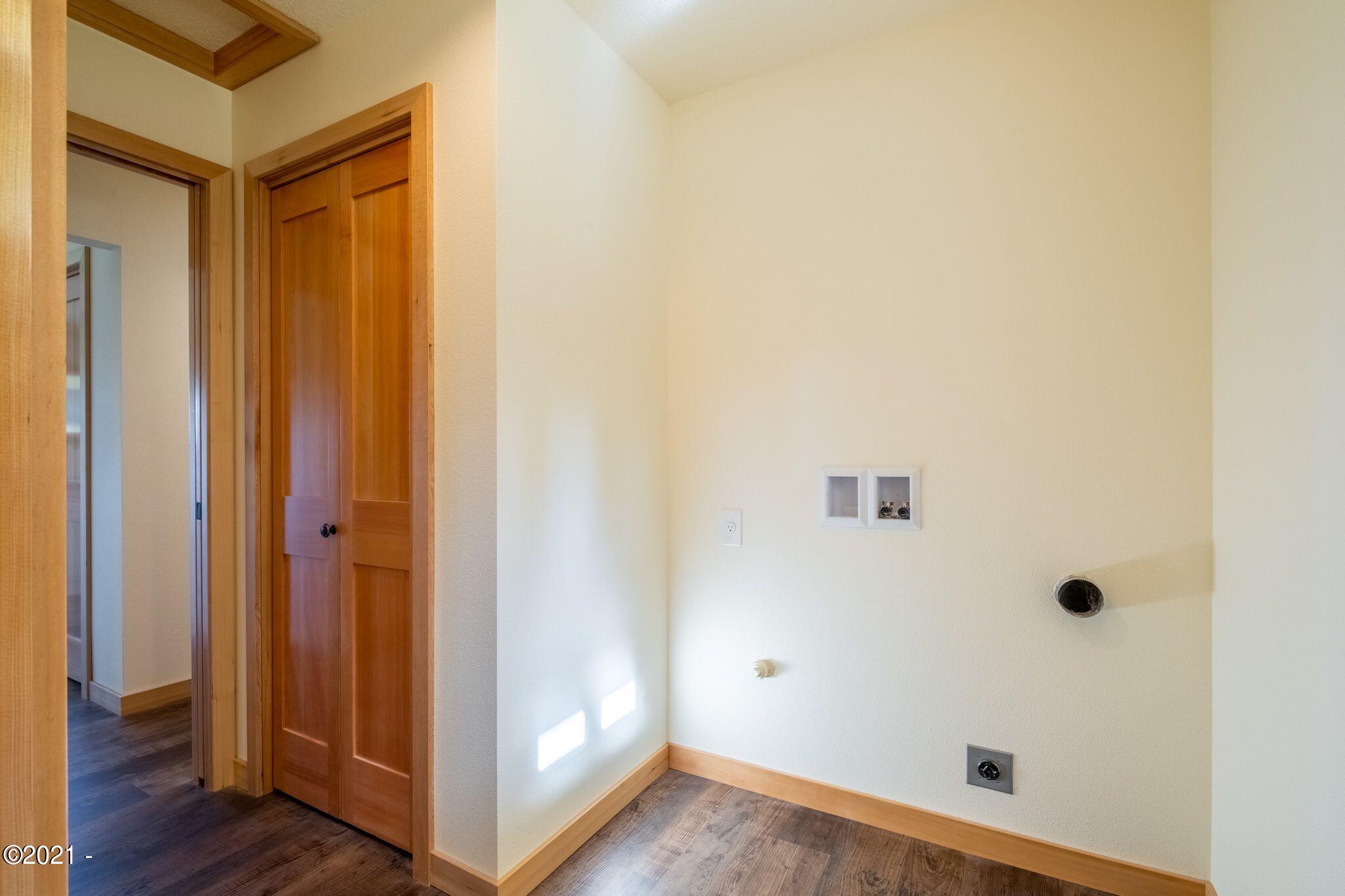 3048 Northeast East Line Road Yachats, OR 97498 - Photo 18 of 31 a view of a small space with wooden floor