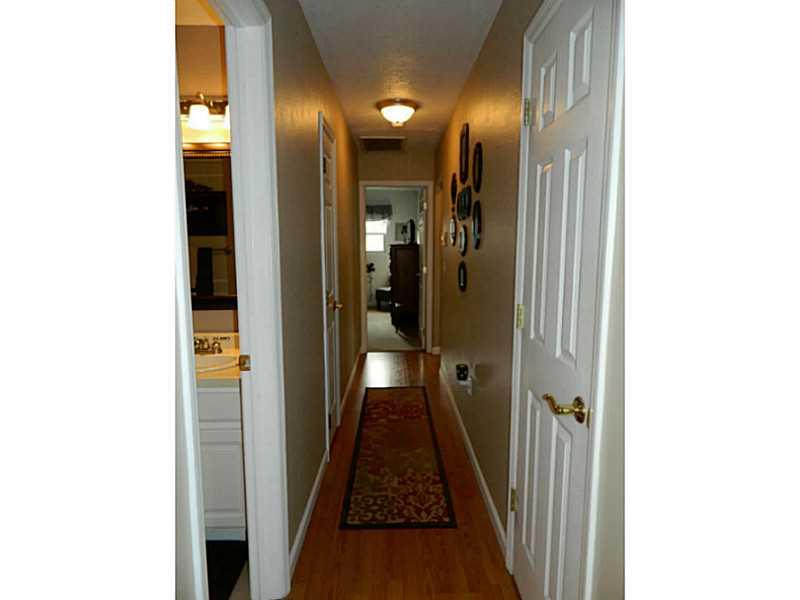 552 Country Club Road Washington, PA 15301 - Photo 13 of 25 1st Floor Plan. The laminate flooring is continued down the hallway to the bedrooms. A large linen closet and coat closet is located in the hallway.