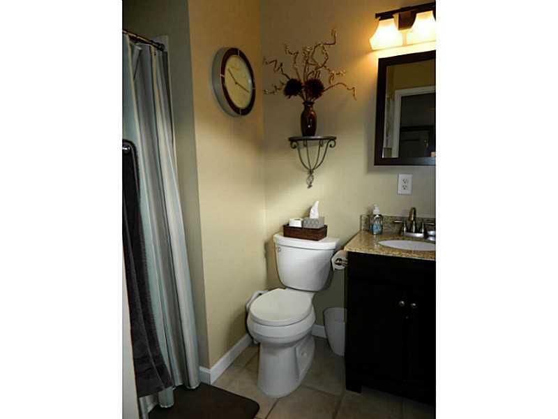 552 Country Club Road Washington, PA 15301 - Photo 16 of 25 Master Bath/Spa. The master bath is modern with an espresso vanity and accent lighting. A shower stall is shown left.