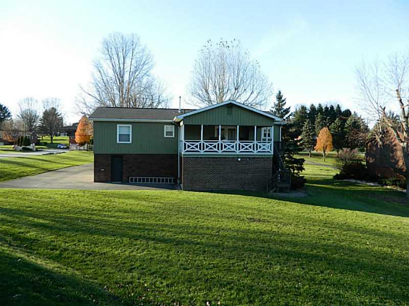 552 Country Club Road Washington, PA 15301 - Photo 4 of 25 Exterior Back. The 3rd garage was formerly gravel and the owner has installed a cement floor to reduce moisture.