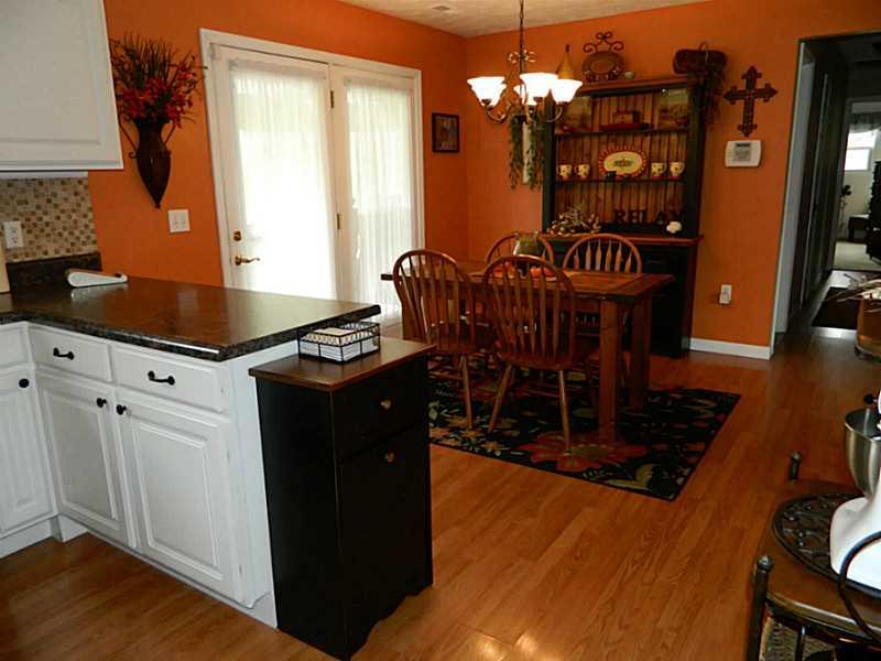 552 Country Club Road Washington, PA 15301 - Photo 10 of 25 Kitchen. The kitchen is open to the dining area with access to the covered rear porch.