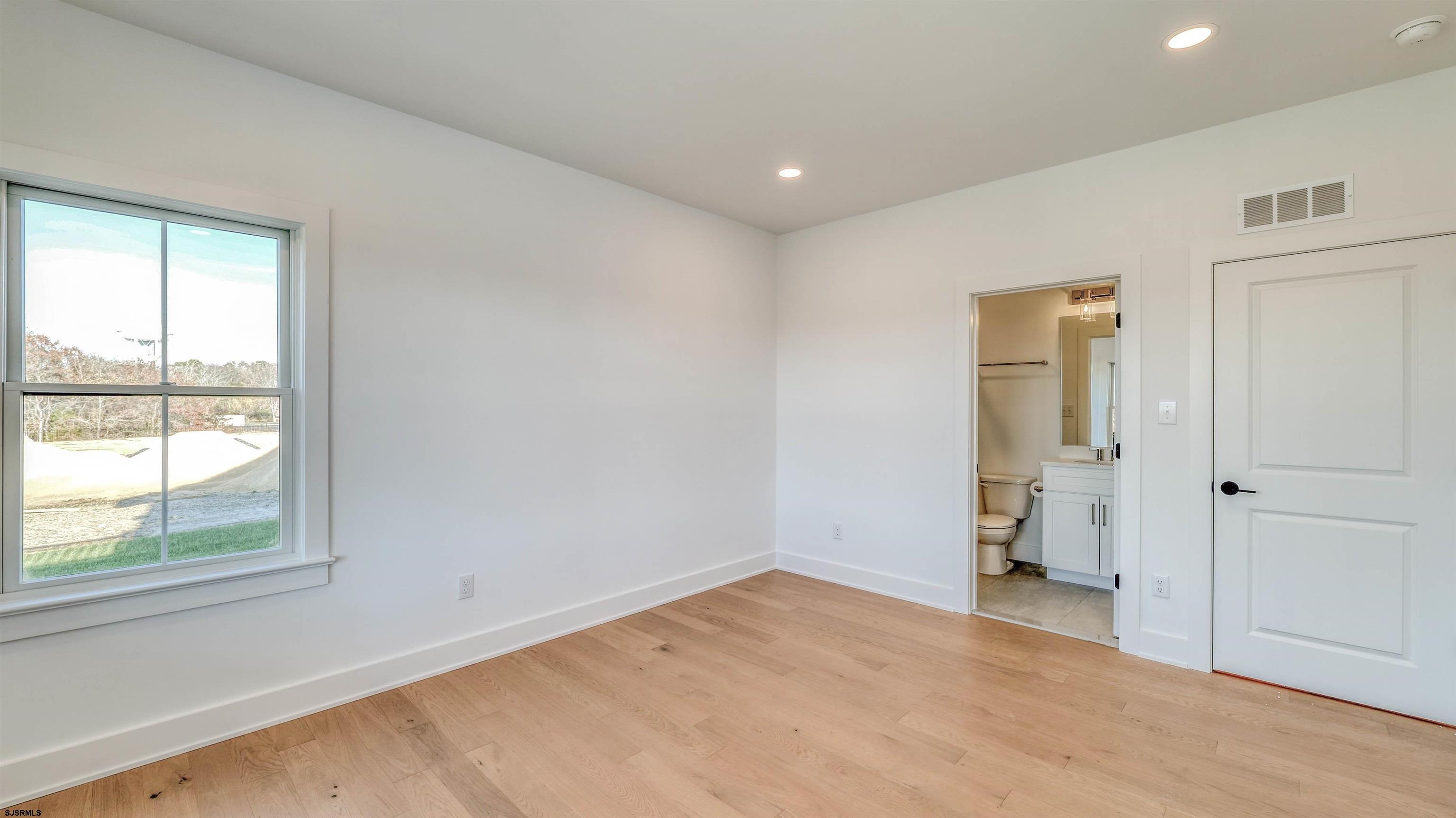 15 Creek Lane Linwood, NJ 08221 - Photo 14 of 50 a view of empty room with windows