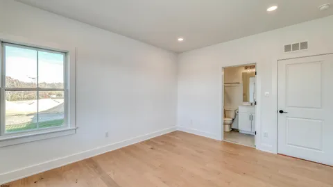 a view of empty room with windows