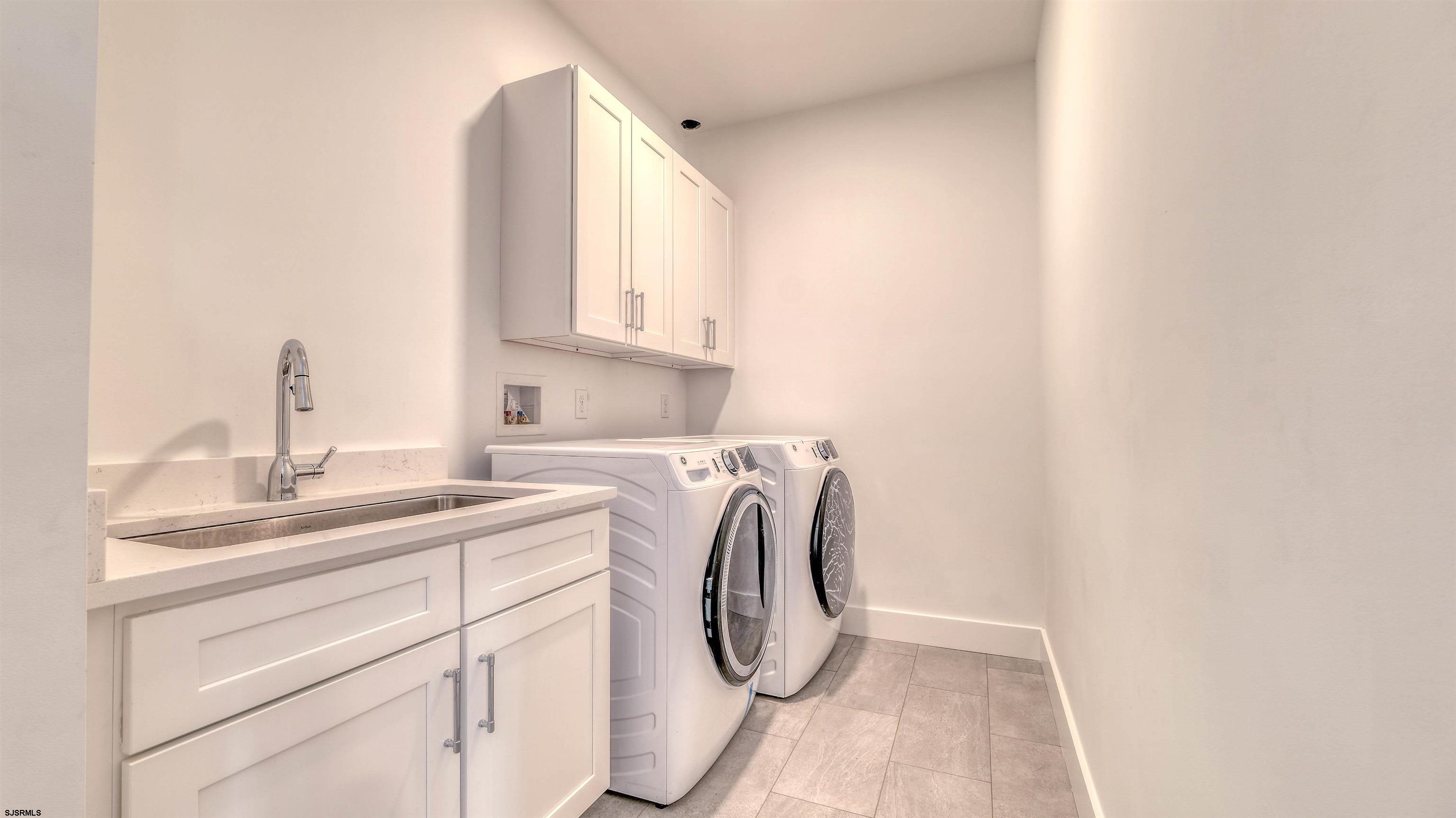 15 Creek Lane Linwood, NJ 08221 - Photo 20 of 50 a utility room with sink dryer and washer