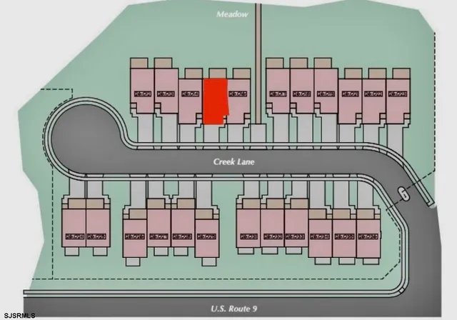a aerial view of a house with a yard basket ball court and outdoor seating