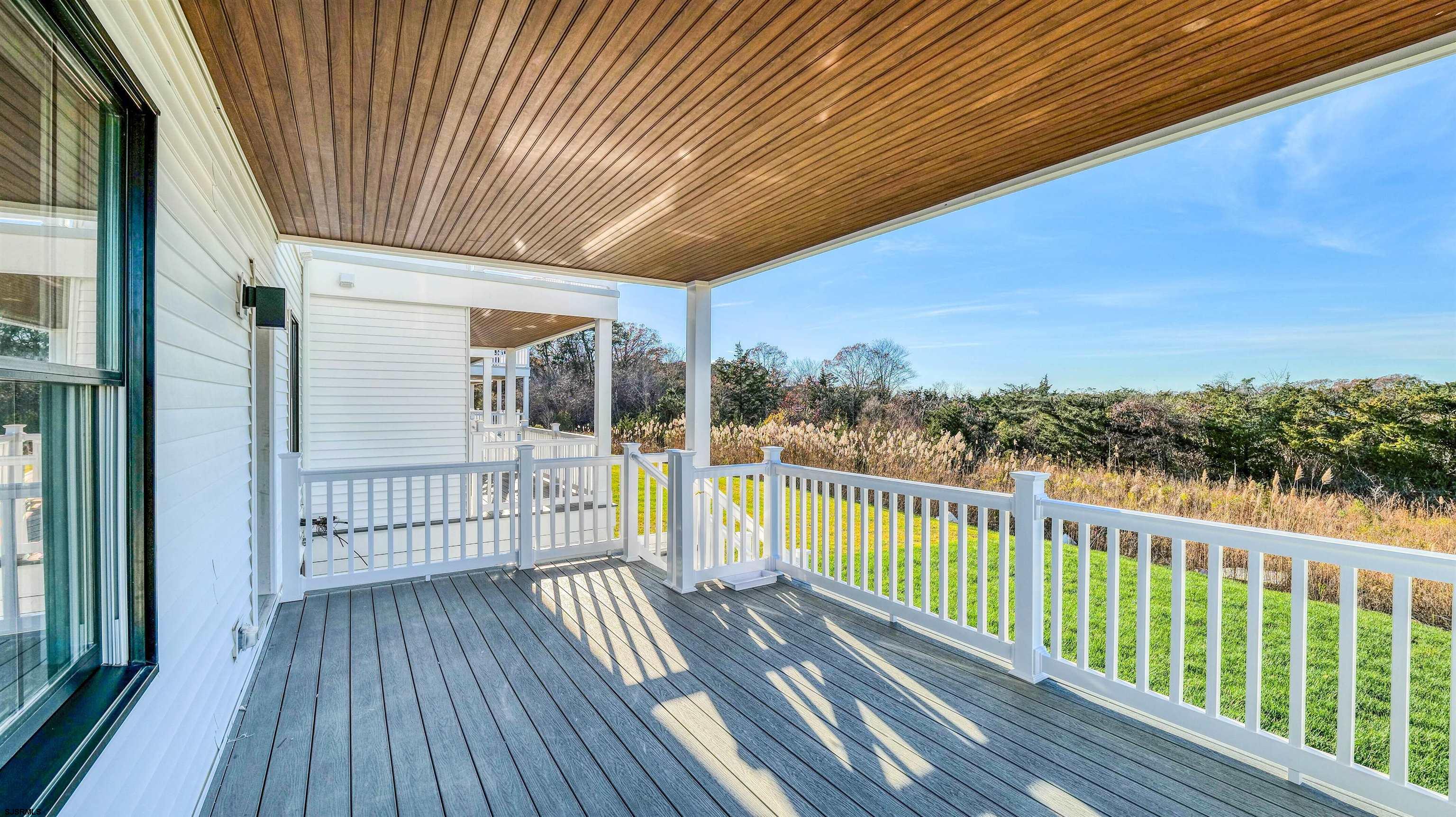 15 Creek Lane Linwood, NJ 08221 - Photo 43 of 50 a view of a balcony with wooden floor