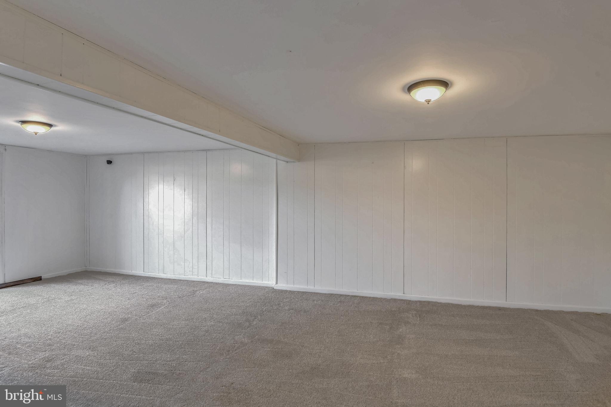 8310 Nightingale Drive Greenbelt, MD 20770 - Photo 23 of 27 a view of an empty room