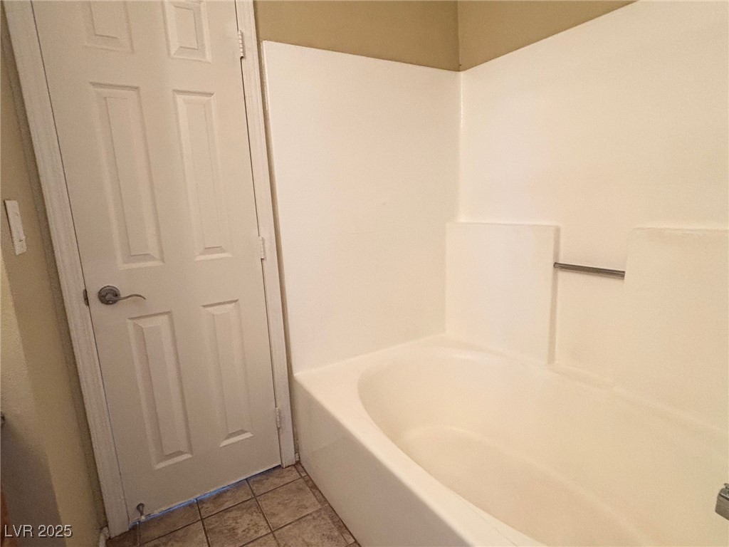 7300 West Pirates Cove Road, Unit 2054 Las Vegas, NV 89145 - Photo 10 of 16 Full bath featuring tile patterned floors