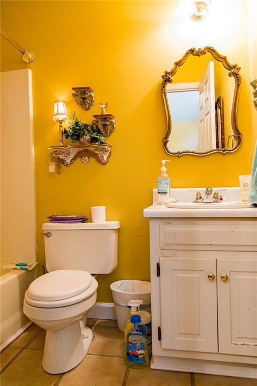 106 Eden Drive Northwest Rome, GA 30165 - Photo 16 of 23 a bathroom with a toilet and a mirror