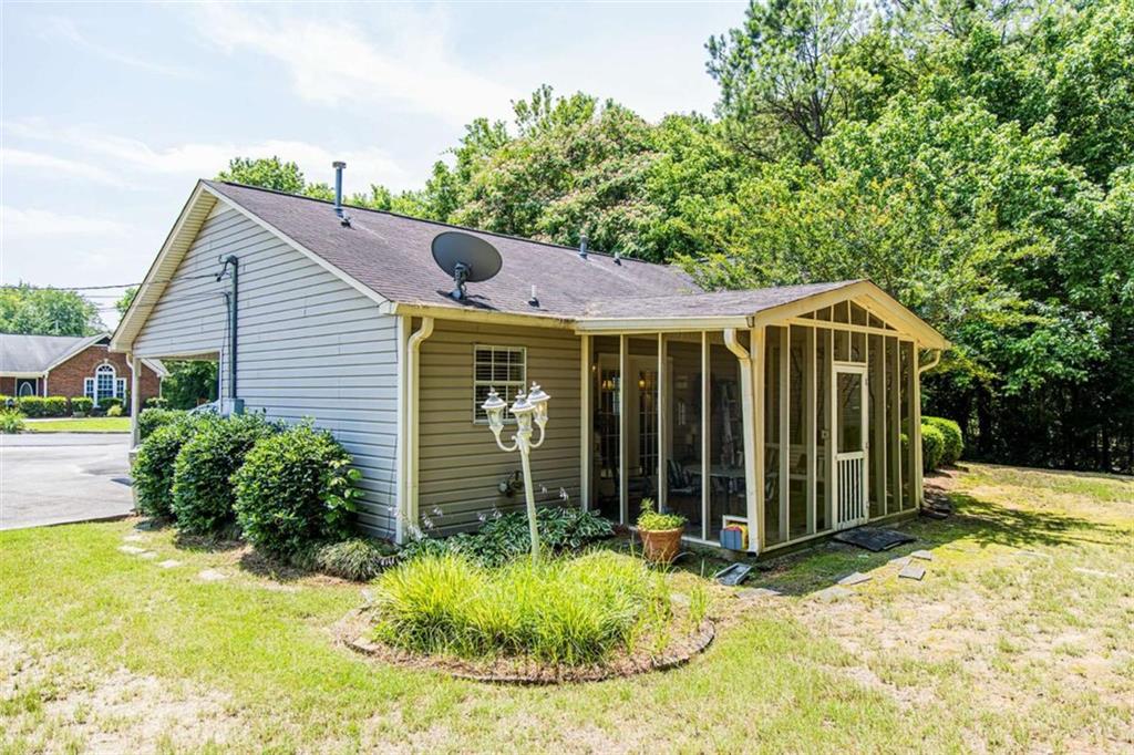 106 Eden Drive Northwest Rome, GA 30165 - Photo 21 of 23 a view of a house with a yard