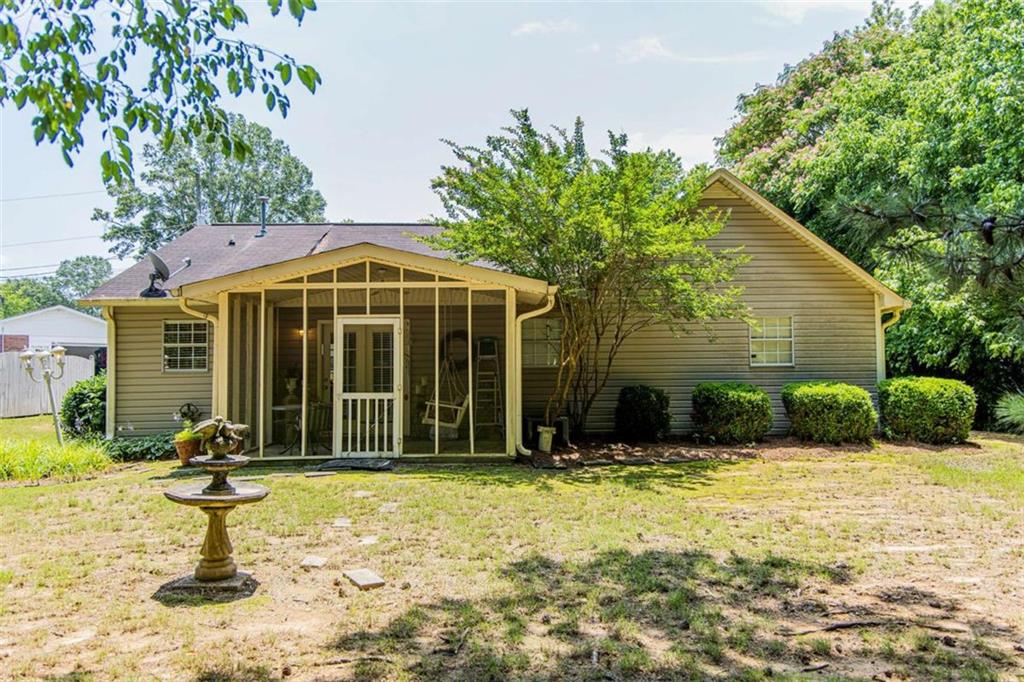 106 Eden Drive Northwest Rome, GA 30165 - Photo 23 of 23 a front view of a house with a yard