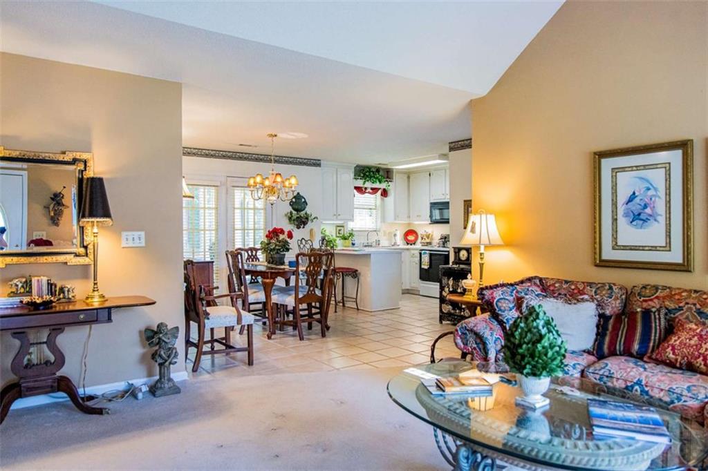 106 Eden Drive Northwest Rome, GA 30165 - Photo 4 of 23 a living room with furniture kitchen view and a large window