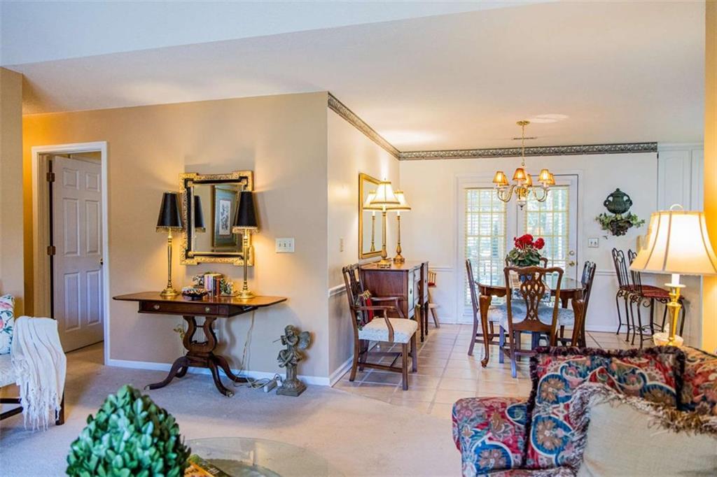 106 Eden Drive Northwest Rome, GA 30165 - Photo 8 of 23 a view of a livingroom with furniture and a window