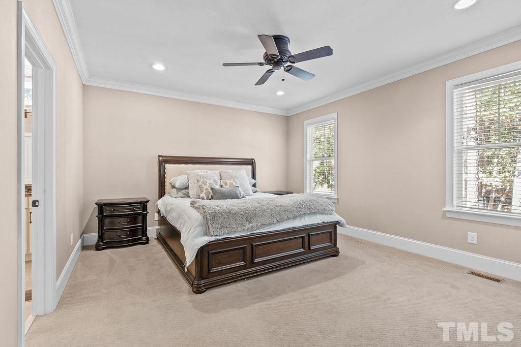 2325 Finley Ridge Lane Raleigh, NC 27615 - Photo 15 of 30 a bedroom with a bed and window