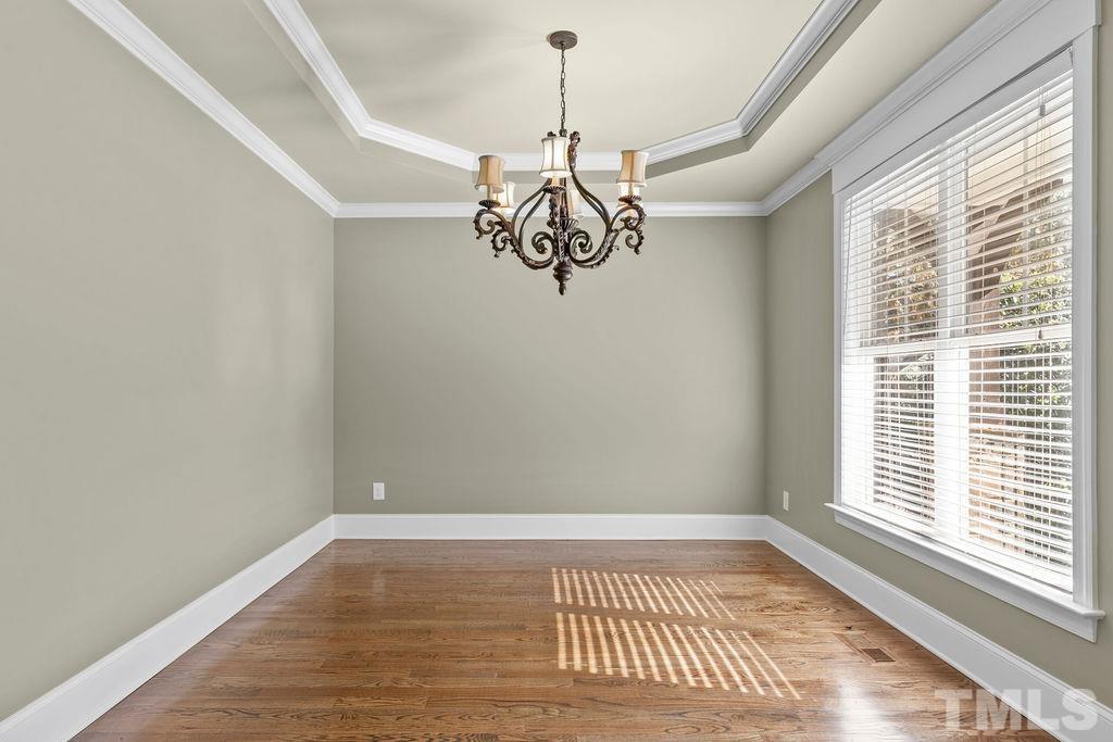 2325 Finley Ridge Lane Raleigh, NC 27615 - Photo 3 of 30 a view of a room with a window and wooden floor