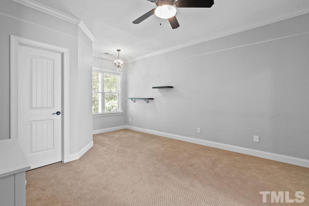 2325 Finley Ridge Lane Raleigh, NC 27615 - Photo 21 of 30 wooden floor in an empty room with a window