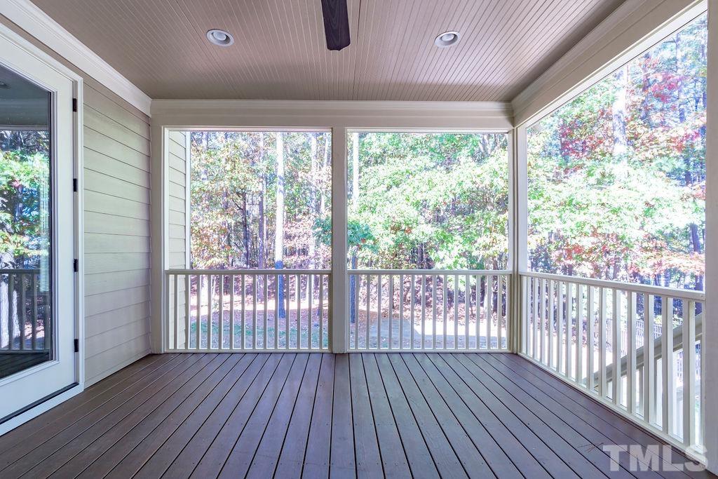 2325 Finley Ridge Lane Raleigh, NC 27615 - Photo 27 of 30 a view of a room with wooden floor and large window