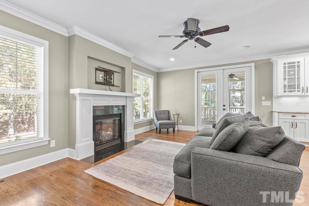 2325 Finley Ridge Lane Raleigh, NC 27615 - Photo 10 of 30 a living room with furniture and a fireplace