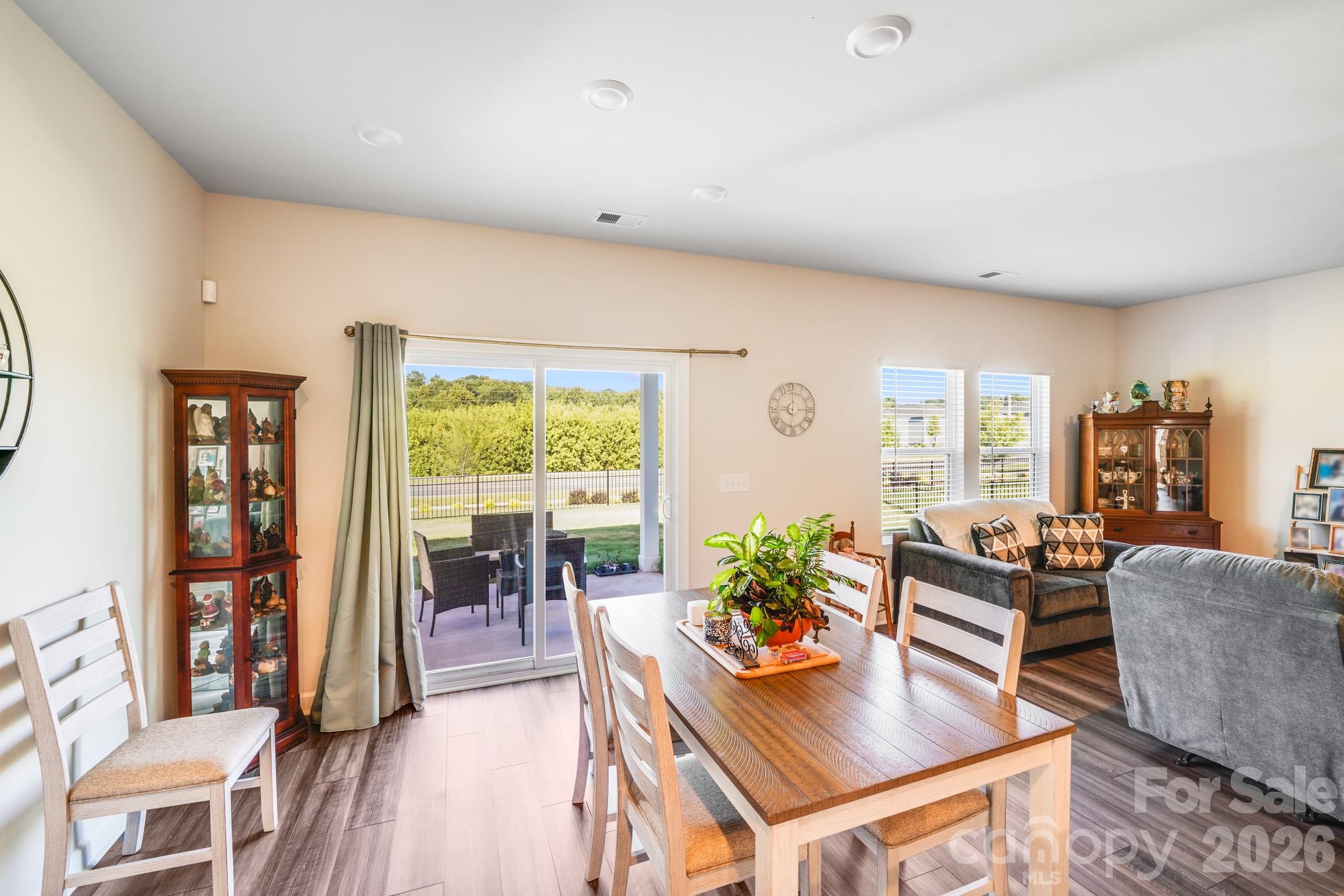1340 Sweet Pea Street Monroe, NC 28110 - Photo 17 of 32 a living room with furniture and a large window