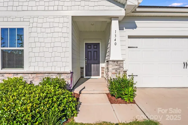 a entryway with flower pots