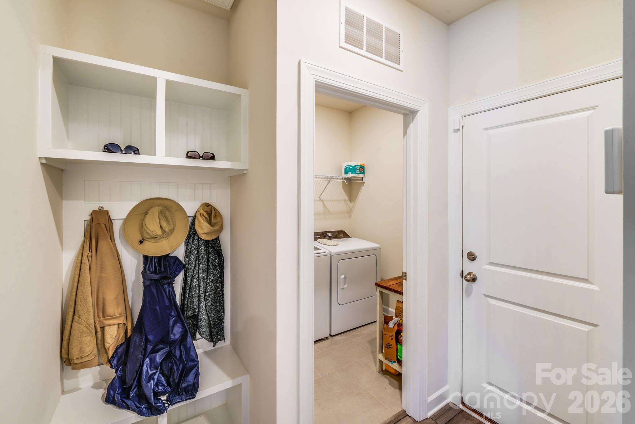 1340 Sweet Pea Street Monroe, NC 28110 - Photo 7 of 32 a view of walk in closet with clothes and shoes