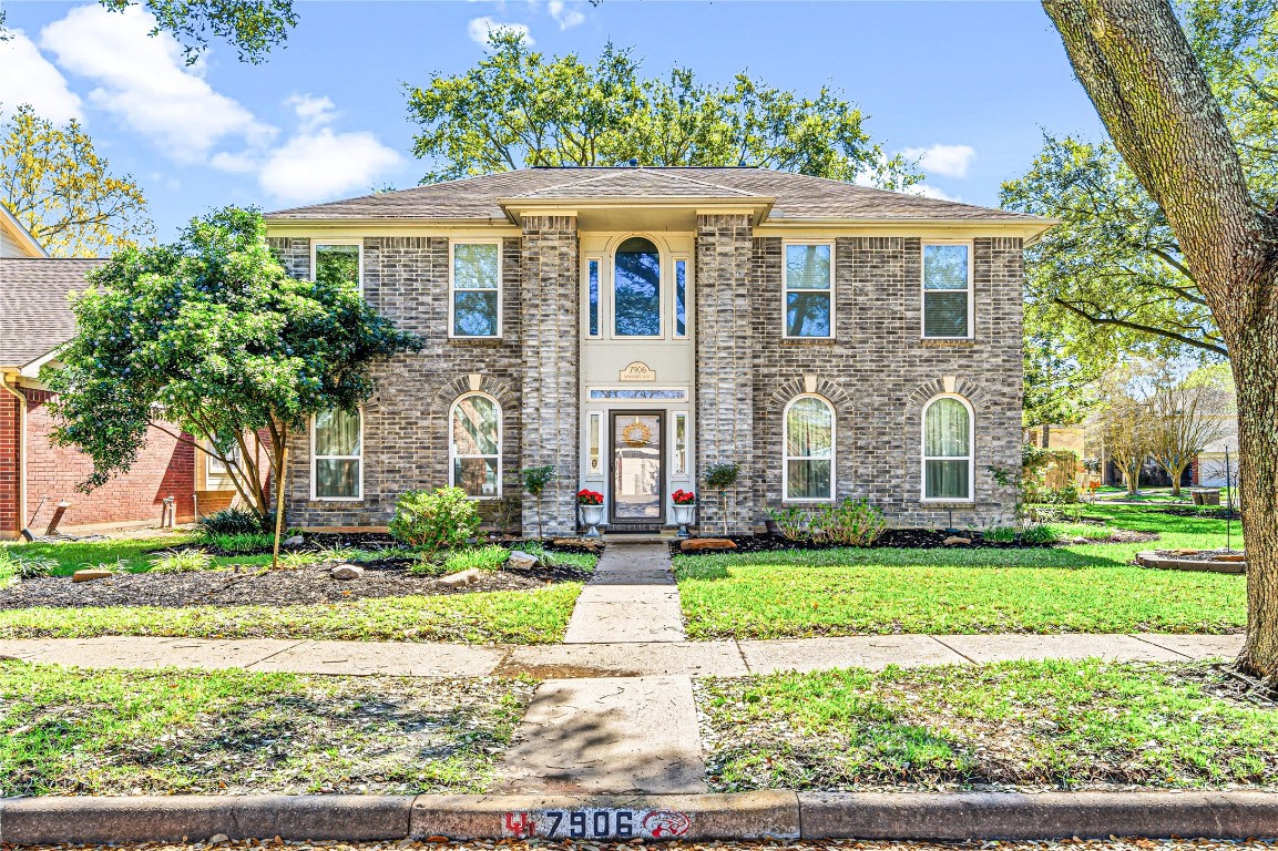 7906 Duncansby Vale Road Houston, TX 77095 - Photo 1 of 48 7906 Duncansby Vale Road: A stately brick façade framed by mature trees will welcome you home every time.