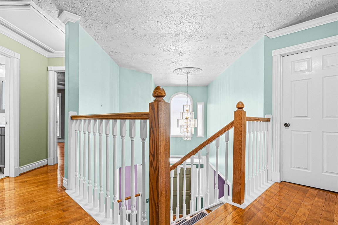 7906 Duncansby Vale Road Houston, TX 77095 - Photo 24 of 48 The open upstairs landing creates a sense of connection and flow throughout the home.