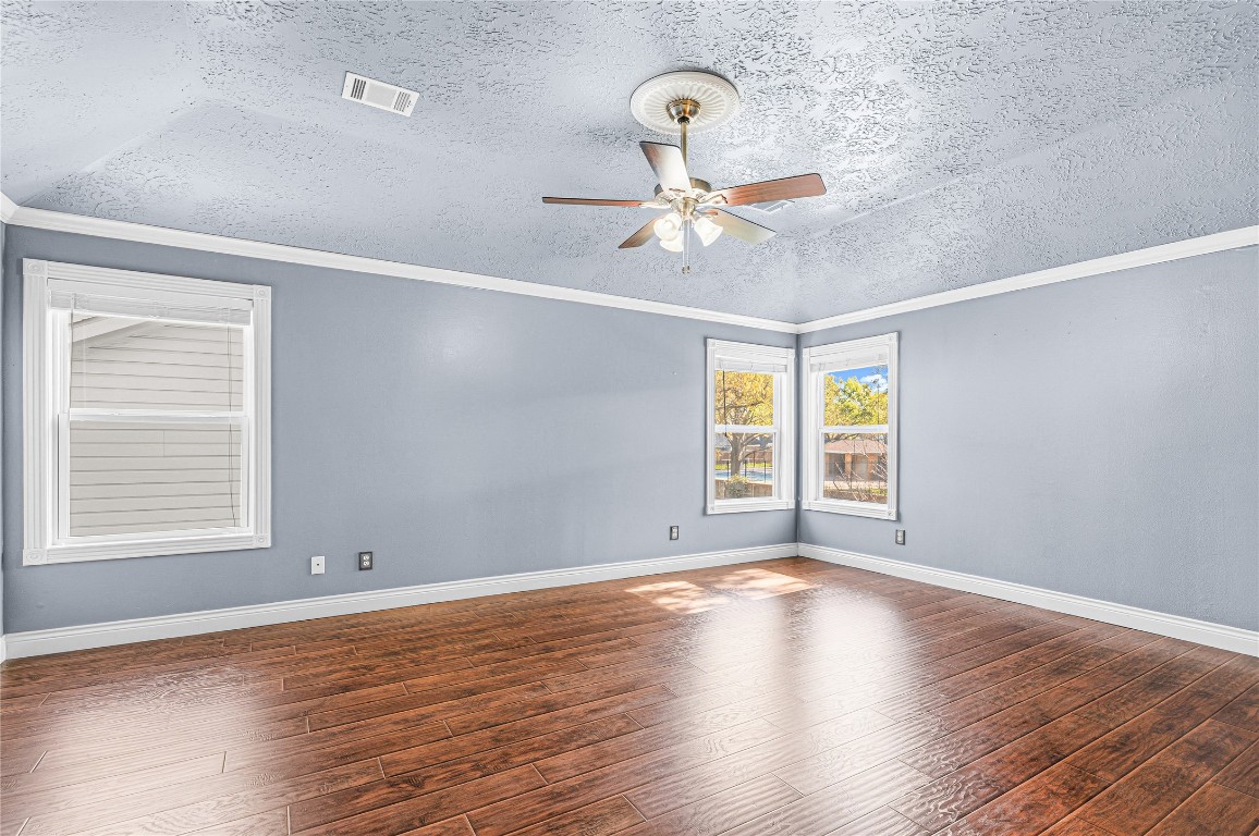 7906 Duncansby Vale Road Houston, TX 77095 - Photo 25 of 48 Generously sized primary bedroom has vaulted ceilings and abundant natural light.