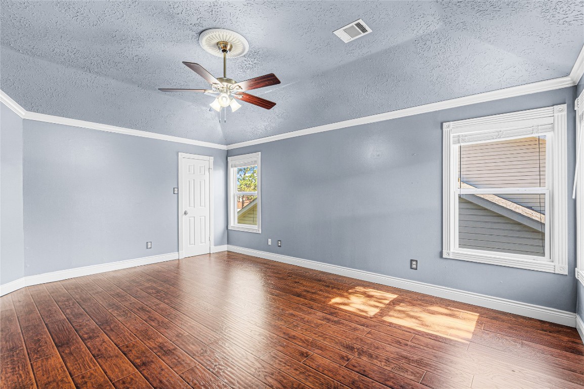 7906 Duncansby Vale Road Houston, TX 77095 - Photo 26 of 48 Generously sized primary bedroom has vaulted ceilings and abundant natural light.