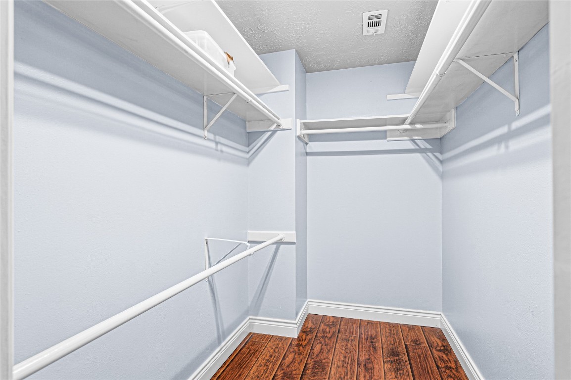 7906 Duncansby Vale Road Houston, TX 77095 - Photo 28 of 48 Large walk-in closet offering ample storage and organization space.