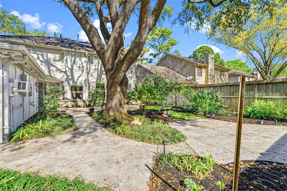 7906 Duncansby Vale Road Houston, TX 77095 - Photo 40 of 48 A private outdoor setting with multiple areas to gather, unwind, and enjoy.