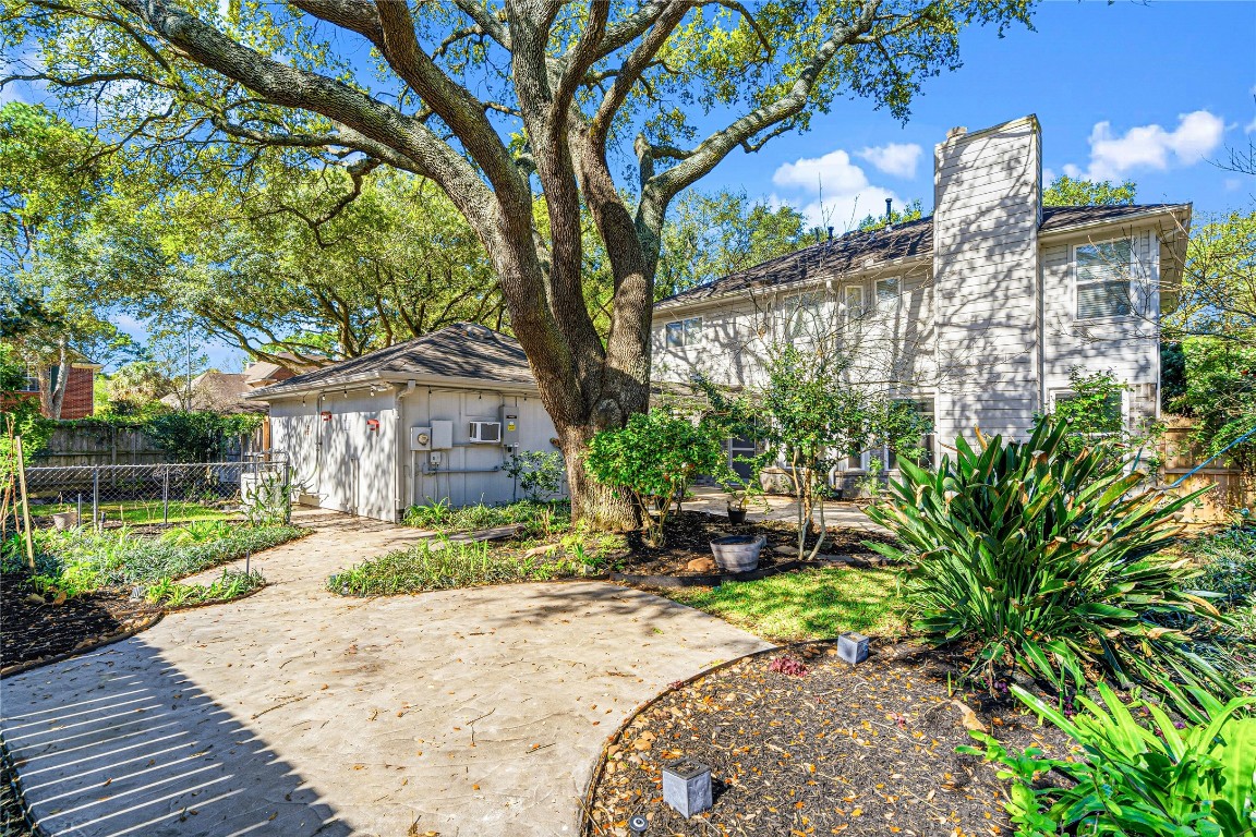 7906 Duncansby Vale Road Houston, TX 77095 - Photo 41 of 48 Established landscaping and shade trees create a peaceful, park-like garden atmosphere.