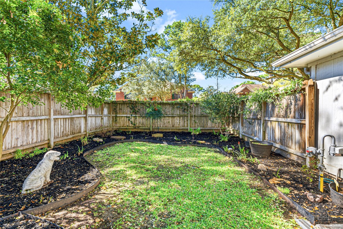 7906 Duncansby Vale Road Houston, TX 77095 - Photo 42 of 48 Extra side yard space that gives you room to enjoy the outdoors year-round.