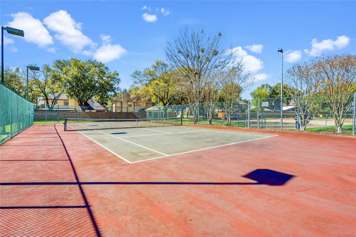 7906 Duncansby Vale Road Houston, TX 77095 - Photo 44 of 48 Community tennis courts provide space to stay active and enjoy the outdoors.