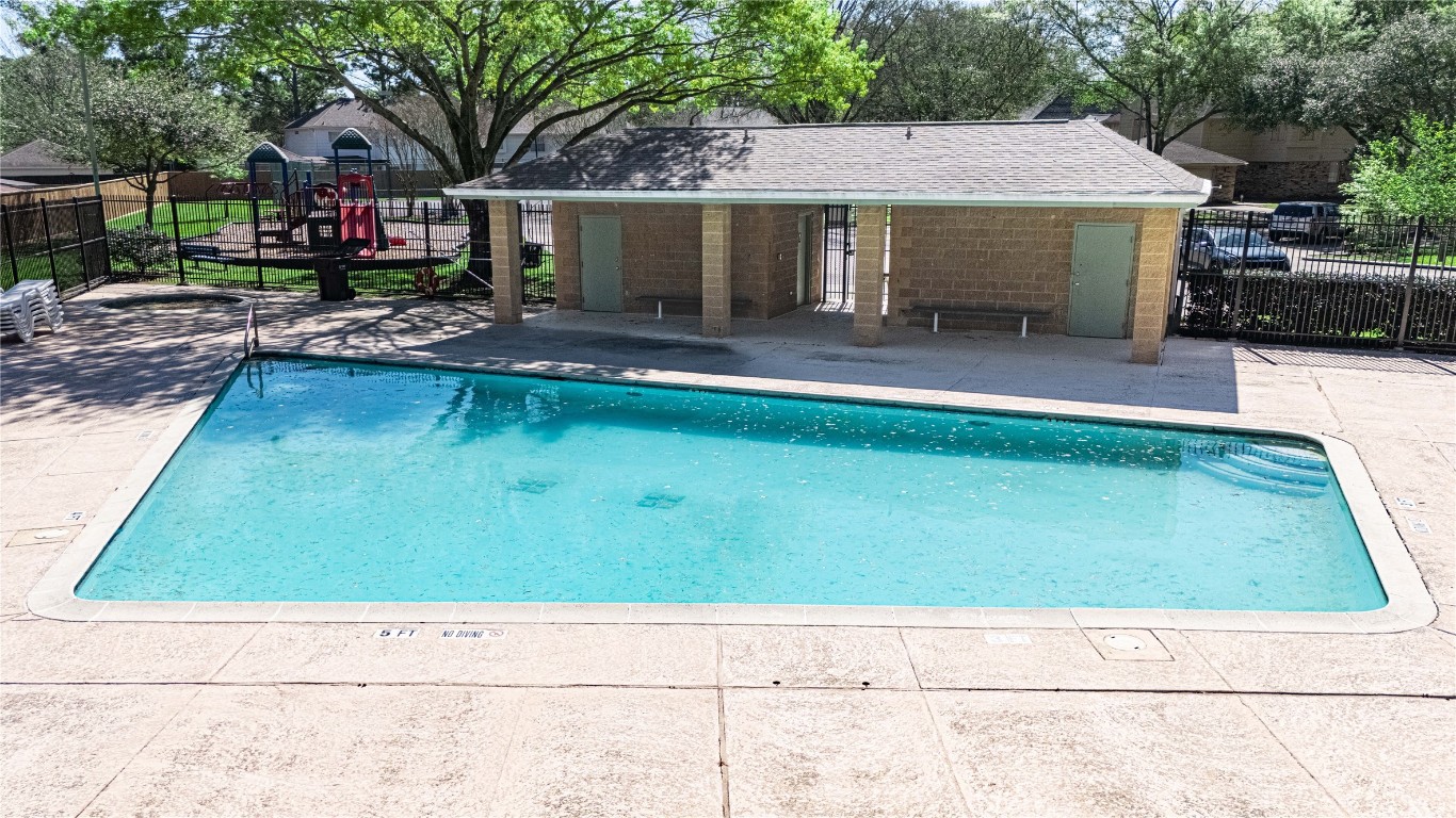 7906 Duncansby Vale Road Houston, TX 77095 - Photo 7 of 48 Neighborhood pool offers a refreshing escape just moments from home.