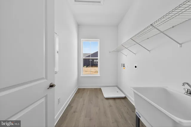 an empty room with wooden floor