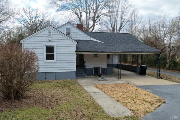 a house with trees in the background