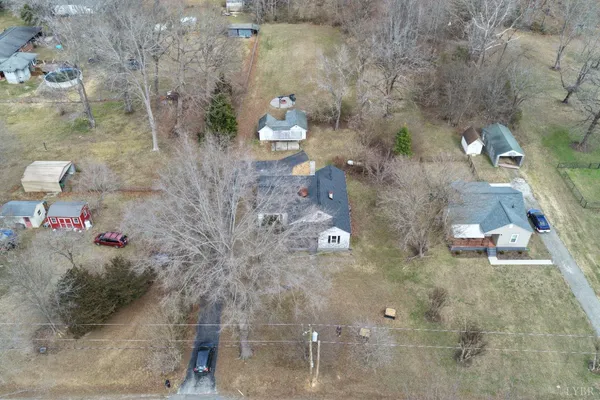 an aerial view of residential house with outdoor space